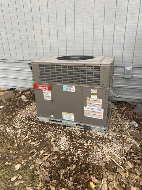 Residential air conditioning unit installed at a Rapid City home